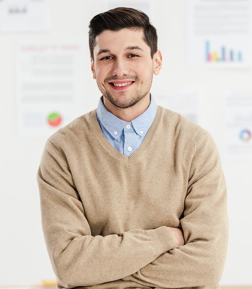 portrait of smiling marketing manager with arms cr 2022 12 16 16 16 02 utc e1701282999543